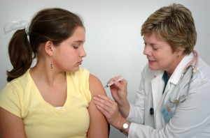 girl getting vaccine